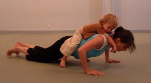 Attempting to do pushups with 25 extra pounds of toddler.